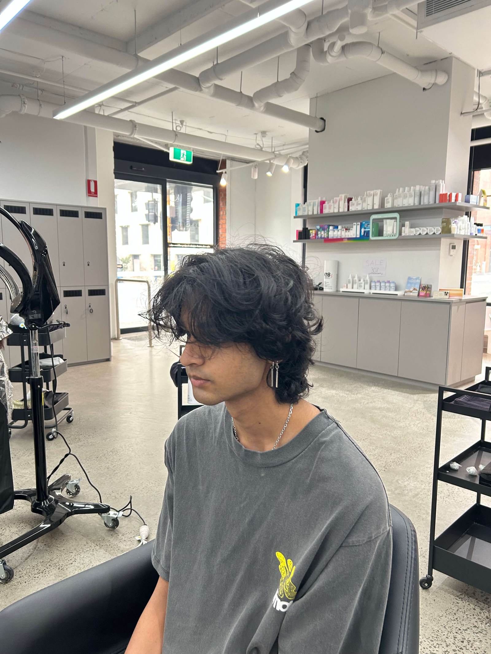 Before the hair transformation at Assort Melbourne: Men's natural dark curly hair 