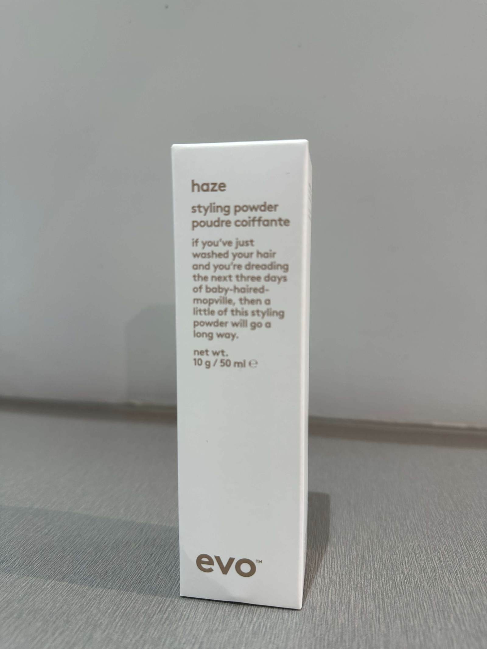 A photo of the EVO Haze Styling Powder used for maintaining healthy, voluminous bangs at Assort Melbourne.