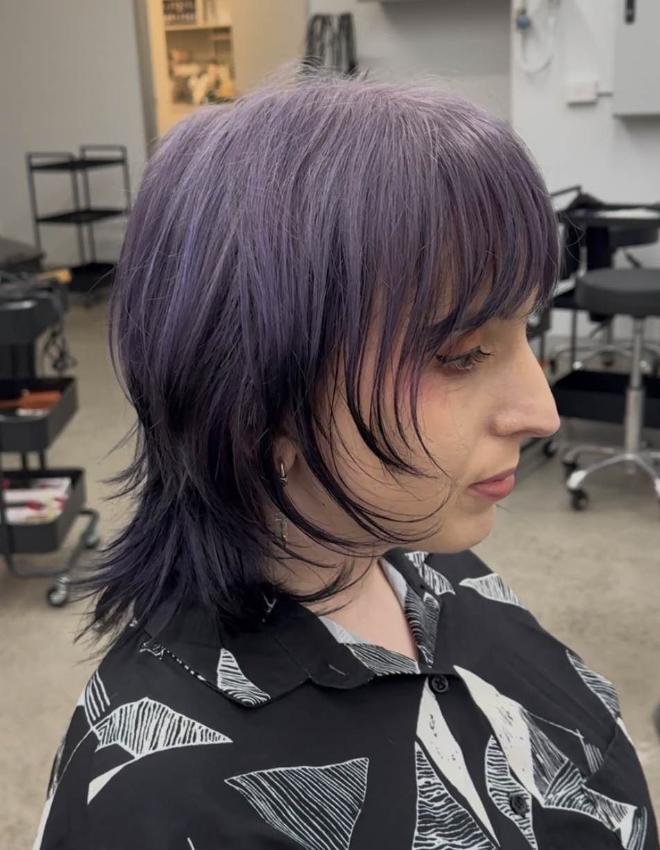 A client at with a Light to Dark Purple Ombre done professionally at Assort Melbourne