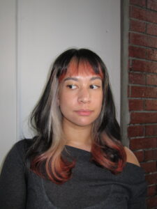 Creative color design at Assort Melbourne showing a bold contrast between bright cool-toned blonde and bold orange tips