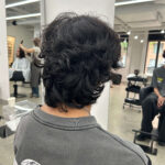 Before the hair transformation at Assort Melbourne: Men's natural dark curly hair 
