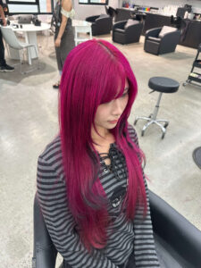 A Hot Magenta with dark tips hair transformation taken at Assort Melbourne