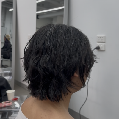 Healthy bouncy textured bob with fringe and face-framing layers at Assort Melbourne.