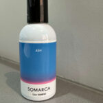 A bottle of Somarca Color Shampoo in Ash, recommended by Assort Melbourne for maintaining cool, icy blonde and platinum hair tones at home.