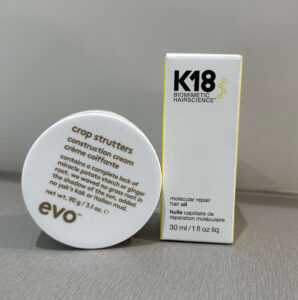 EVO Crop Strutters and K18 Hair Oil displayed on a sleek salon shelf at Assort Melbourne.