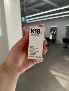 K18 Leave-in Molecular Repair Hair Mask, the stylist-recommended treatment for repairing curly hair structure and adding strength, available at Assort Melbourne.