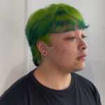 A client at with Green hair done professionally at Assort Melbourne