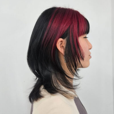 A client at Assort Melbourne with bold black and red color blocking.