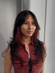 A client at Assort Melbourne with bold black and red innner color blocking or also known as a Peekaboo design