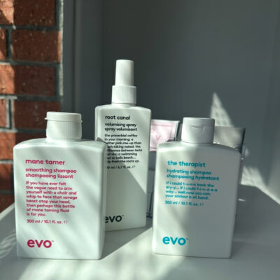 Product line up at Assort Melbourne of EVO Mane tamer Shampoo, Root Canal Volumising Spray and The Therapist Shampoo.