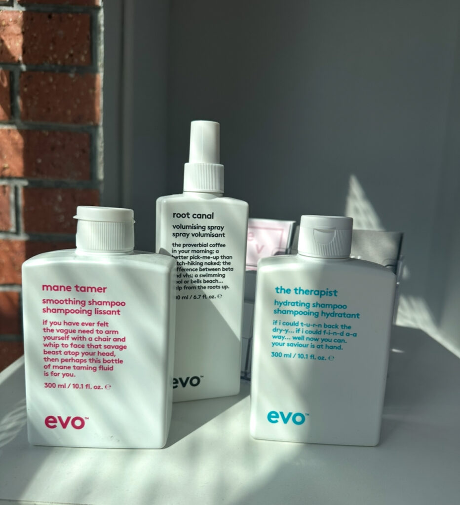Product line up at Assort Melbourne of EVO Mane tamer Shampoo, Root Canal Volumising Spray and The Therapist Shampoo.