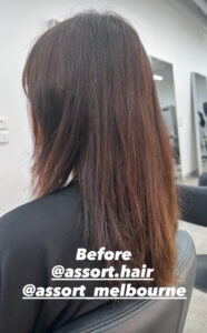 Client with faded, patchy reddish-brown hair before a color correction at Assort Melbourne.