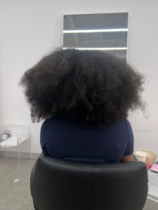 High-volume 4C natural hair texture before a Japanese Straightening treatment.