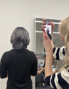 A stunning metallic silver layered bob with high-shine finish at Assort Melbourne.